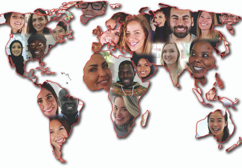 worldmap covered with smiling people face